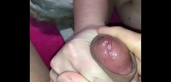  My amateur wife giving a lovely sloppy hand job close up and spit soaked